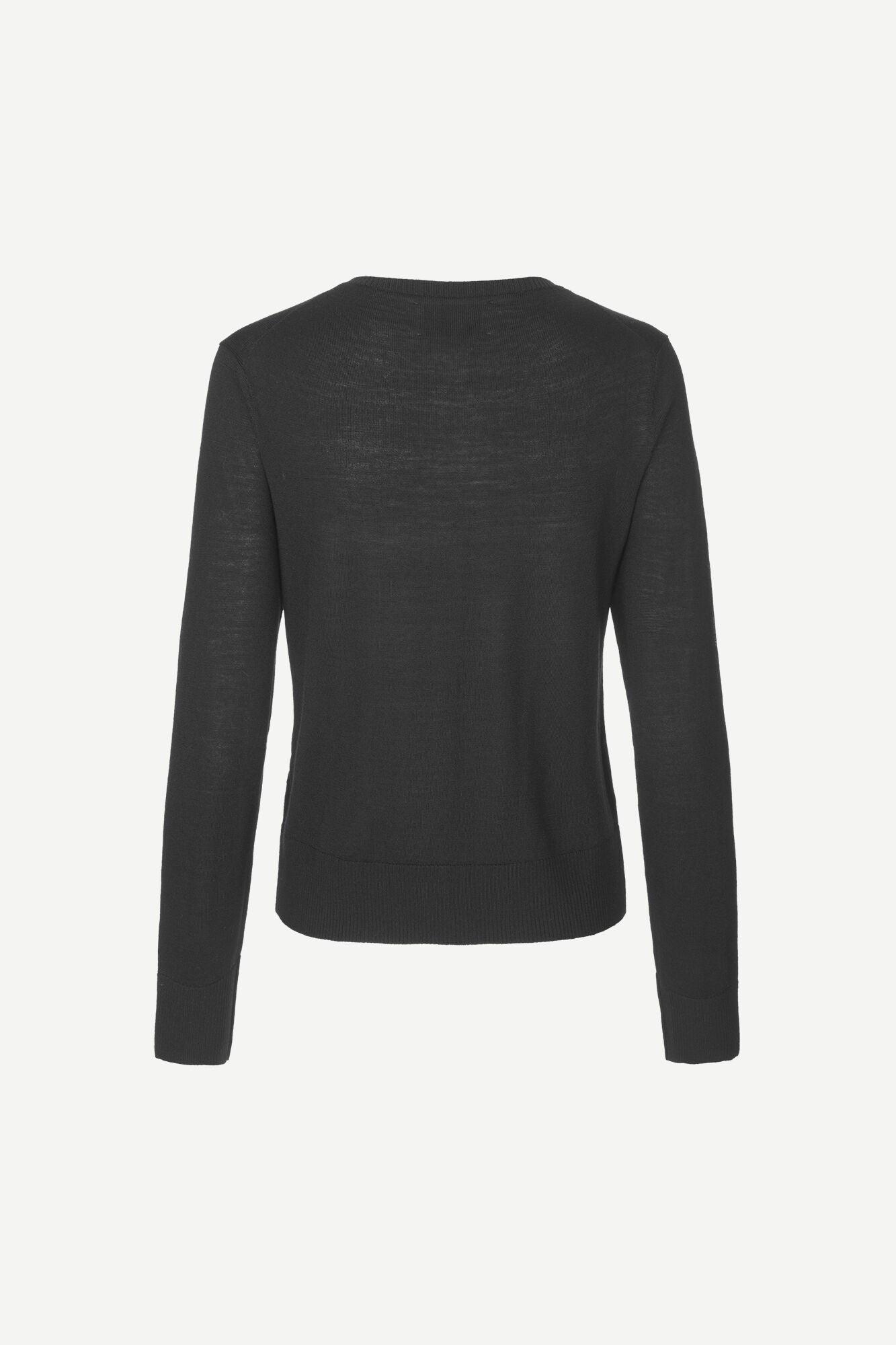 Svart cardigan med lange ermer, sett bakfra, enkel og feminin stil.